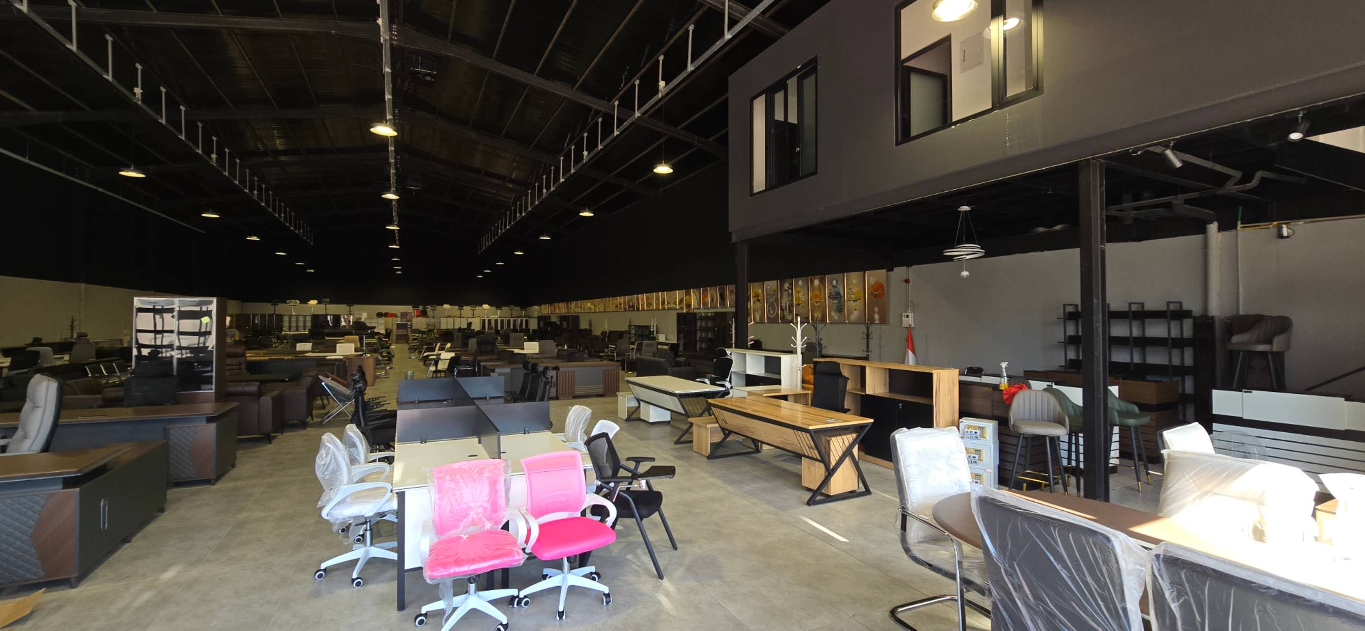 UAE buyer showroom-floor reference with office desks, workstations and display mix