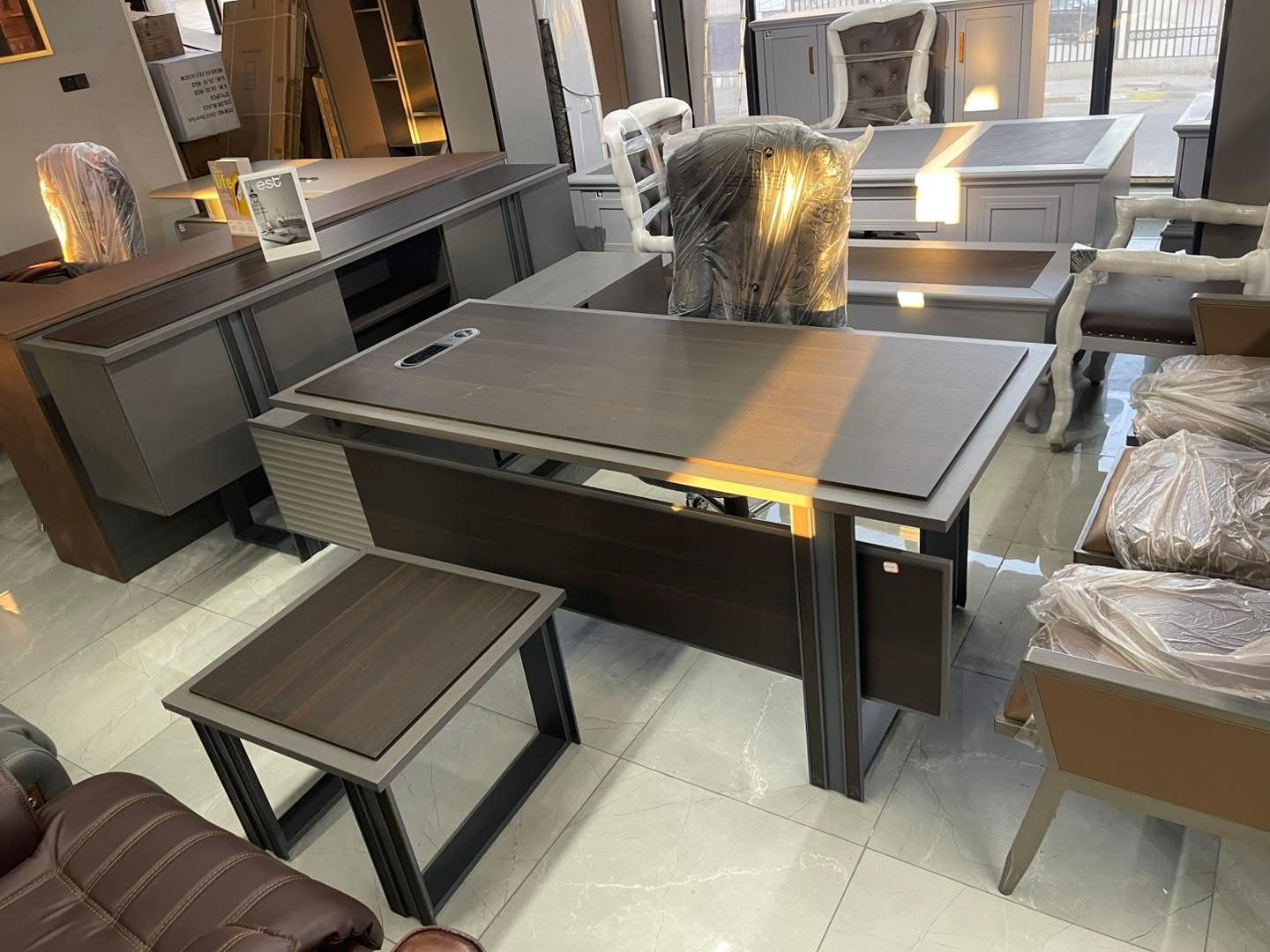 Rwanda buyer showroom-floor reference with office desks, storage and display mix