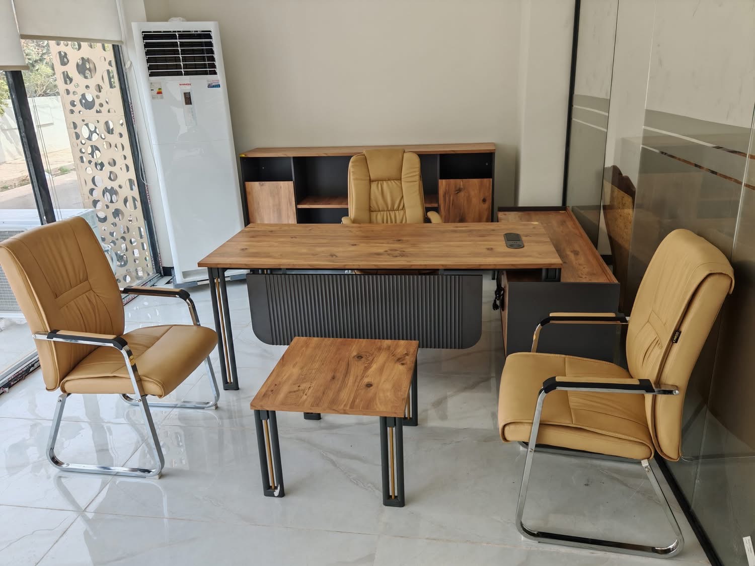 Southern Africa buyer showroom-floor reference with office desks, storage and display mix