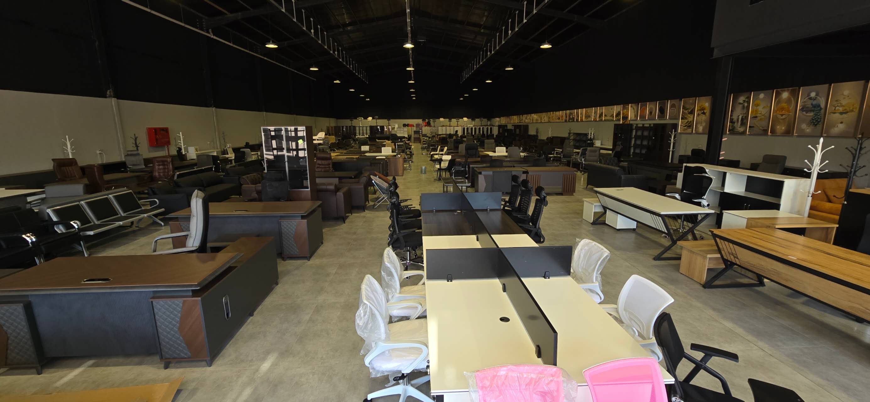 Zimbabwe buyer showroom-floor reference with office desks, storage and display mix